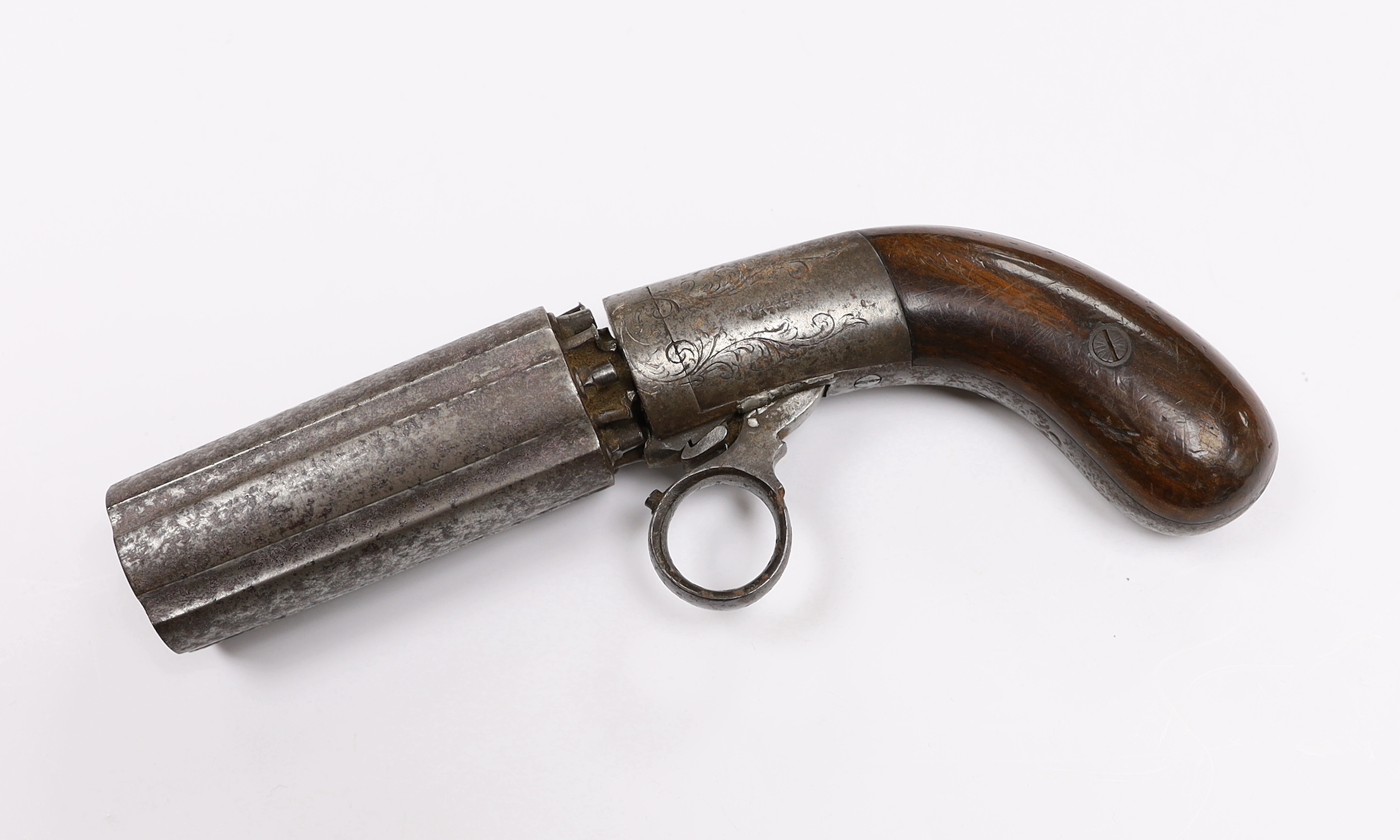 A 19th century, six barrel under action percussion pistol, with engraved lock and walnut grip, stamped ‘Coopers patent’, barrel 8.6cm